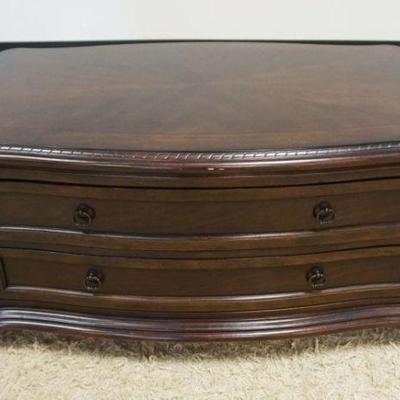 1232	MAHOGANY SCALLOPED EDGE COCKTAIL TABLE W/DRAWERS, APPROXIMATELY 48 IN X 31 IN X 21 IN HIGH
