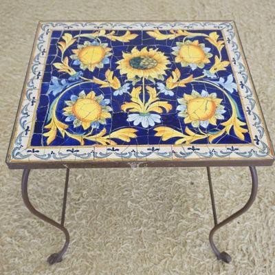1256	DISTRESS SUN FLOWER TILE TOP TABLE ON IRON BASE, APPROXIMATELY 22 IN X 19 IN X 25 IN H
