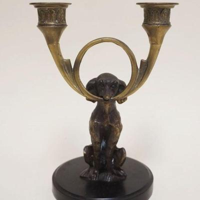 1011	FIGURAL BRASS DOUBLE CANDLESTICK W/FIGURE OF A DOG AT BASE, APPROXIMATELY 9 1/2 IN HIGH
