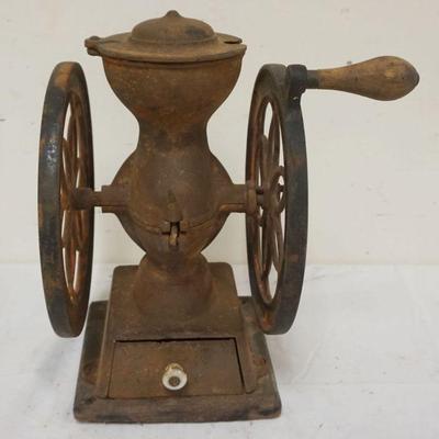 1064	ANTIQUE MINIATURE 2 WHEEL COFFEE GRINDER LANDERS FRARY & CLARK COUNTY STORE COUNTER TOP COFFEE GRINDER, TOP CAST IRON CAP HAS LOSS
