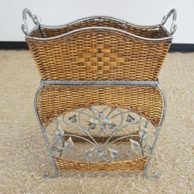 1255	ORNATE IRON AND WOVEN WICKER PLANT STAND, APPROXIMATELY 24 IN X 10 IN X 30 IN H
