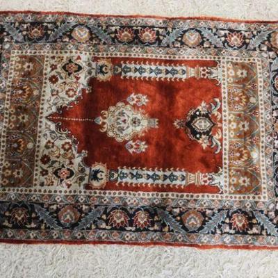 1291	SILK HAND STICHED THROW RUG, APPROXIMATELY 37 IN X 24 IN

