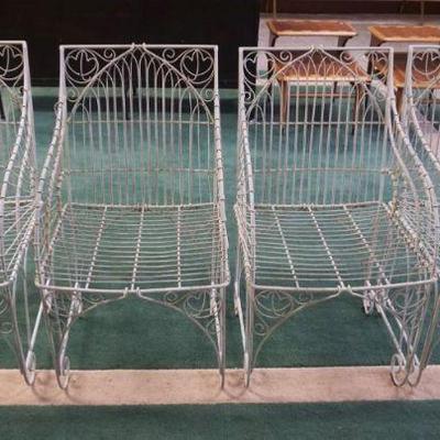 1254	SET OF 4 ORNATE WIRE ARM CHAIRS FOR PATIO OR SUN ROOM, EACH APPROXIMATELY 19 IN X 20 IN X 36 IN H
