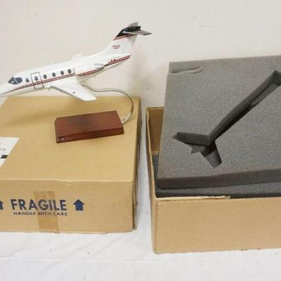1282	SCALE MODEL OF AN AIRPLANE W/STAND & BOX, PLANE APPROXIMATELY 17 IN LONG
