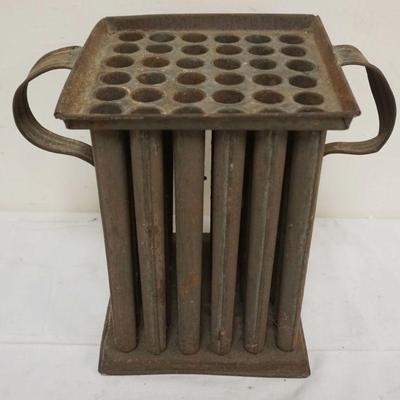 1067	ANTIQUE TIN COUNTRY 36 PART CANDLE MOLD, APPROXIMATELY 12 IN X 8 IN X 10 1/2 IN
