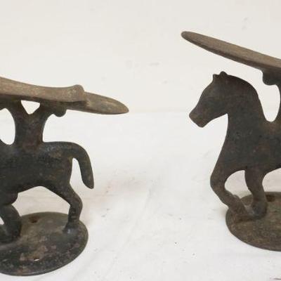 1049	PAIR OF FIGURAL HORSE SHOE SHINE FOOT RESTS, EACH APPROXIMATELY 7 IN HIGH
