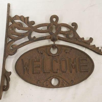 1059	CAST IRON REVOLVING COMICAL ENTRY SIGN *WELCOME & GO AWAY*, APPROXIMATELY 11 IN X 12 IN
