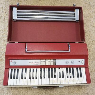 1285	ACE TONE ELECTRIC ORGAN MODEL TOP-5, APPROXIMATELY 15 IN X 31 IN X 9 IN, UNTESTED, SOLD AS IS, SHOULD BE GONE OVER THOROUGHLY BY A...