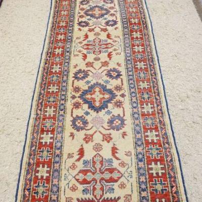 1208	PERSIAN WOOL RUNNER, APPROXIMATELY 11 FT X 3 FT
