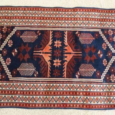 1289	WOOL HAND STICHED THROW RUG, APPROXIMATELY 53 IN X 31 IN
