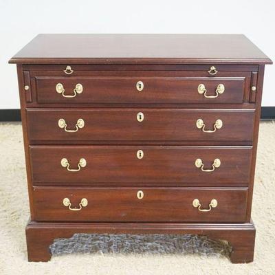 1216	HENKEL HARRIS MAHOGANY BACHELOR CHEST, 4 DRAWERS W/PULL OUT SURFACE ON BRACKET FEET, APPROXIMATELY 34 IN X 18 IN X 31 IN HIGH
