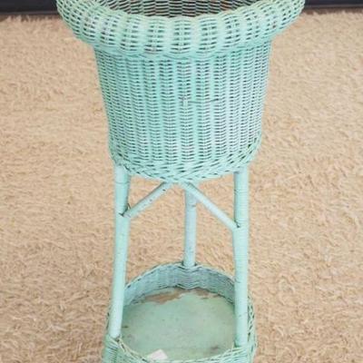 1244	WICKER PLANTER, APPROXIMATELY 14 IN X 36 IN H
