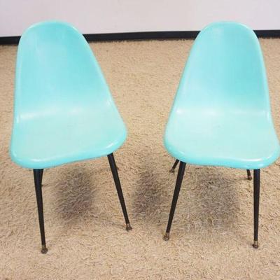1266	2 MID CENTURY MODERN PLASTIC TURQUOISE CHAIRS
