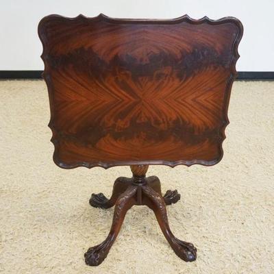 1222	FLAMED MAHOGANY SCALLOPED EDGE SQUARE TILT TOP TABLE W/CARVED BALL & CLAW FEET, APPROXIMATELY 38 IN X 25 IN X 28 IN HIGH
