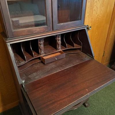 Mahogany antique secretary - key included. 3 Drawers. Chippendale style. Missing knob on interior drawer.