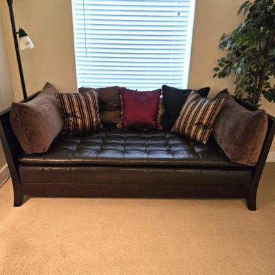 Pretty Daybed with Brown Faux Leather Upholstery and Wood Sleigh Bed Style Sides 84