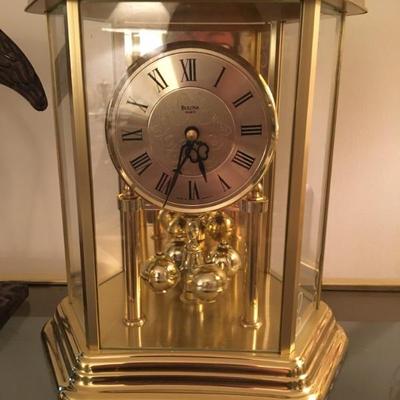 Battery-powered anniversary clock, made in Germany, working, heavy brass