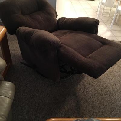 Very comfy deep-brown-colored recliner; reclines almost to a full 180 degrees
