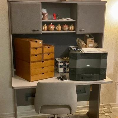 Office desk, storage cabinet, decorative items