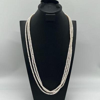 Very Long Strand of Faux Pearls
