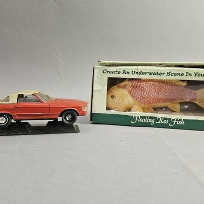 Lot 69 | Floating Koi Fish and Die Cast Car