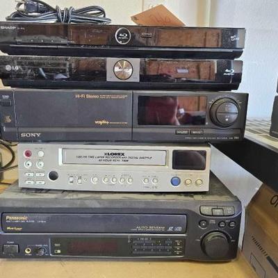 #1036 • 2 Blu-ray Players Laser Disk Player and 2 VHS Players
