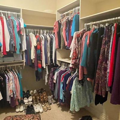 closet of clothes and shoes