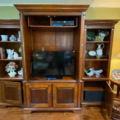 3 piece wall unit with Insignia flat screen TV, JDC dvd player and Sony speakers