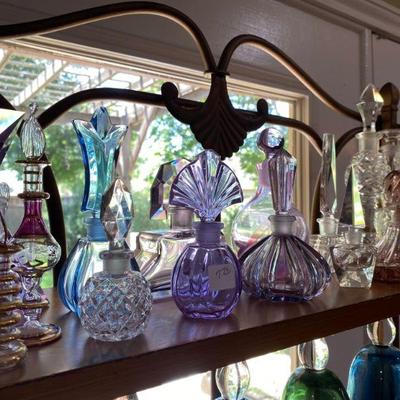 Perfume bottle and colorful glassware collection