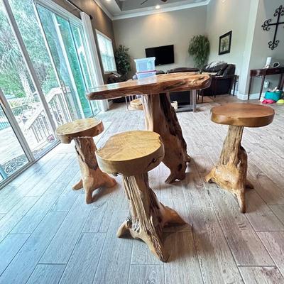 One of a kind, driftwood bistro table with four stools
