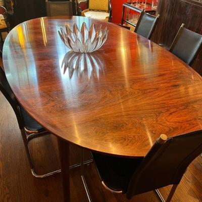 MCM oval dining table with two leaves, walnut top with teak legs, 8’ long without additional leaves