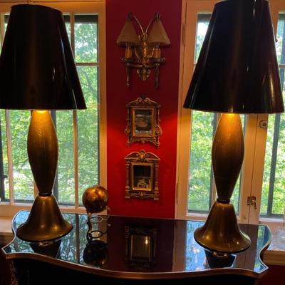 A pair of monumental, mid century, Hollywood Regency style, black and gold Murano glass table lamps
