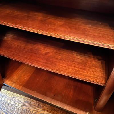 1920s Art Deco macasser ebony sideboard with brass mounts and a marble top, French