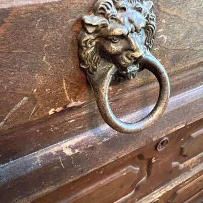 Antique dresser with brass lions head pulls 