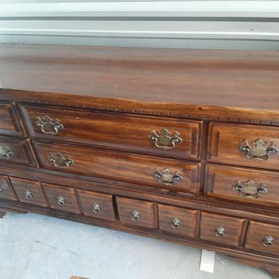 8 drawer dresser measures 33 1/2 inches tall x 66 inches wide x 18 1/2 inches deep.  $225 includes aforementioned hutch mirror