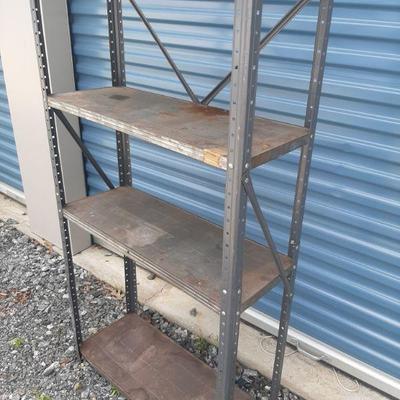 4 shelf metal stand $5.00 Measures 56 inches tall x 11 1/2 inches deep x 29 1/2 inches wide