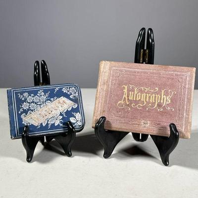 (2PC) AUTOGRAPH ALBUM AND PERSONAL NOTEBOOK | Small books of autographs from a wide range of signers Album of signed personal notes from...