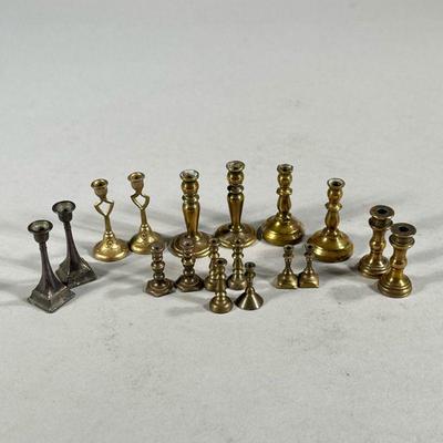 MINIATURE BRASS & OTHER CANDLESTICKS | Includes 9 pairs of miniature candlesticks, smallest less than 1inch tall. - h. 1.75 in (tallest)

