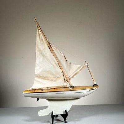 ENDEAVOUR IV POND BOAT | Marked Endeavour IV on hull. Marked Star MK 4 on sail. - l. 18 x w. 5.5 x h. 6 in (Height is boat only, not...