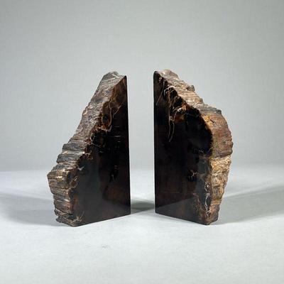 AGATE BOOKENDS | Two heavy agate bookends with a smooth dark brown stone, unpolished outer layer, and green felt pads. - l. 3.5 x w. 1.5...