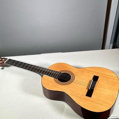(1PC) HOHNER ACOUSTIC GUITAR | 6-string hand-crafted acoustic guitar by Hohner. Model #: HC-03. Case included. - l. 36 in

