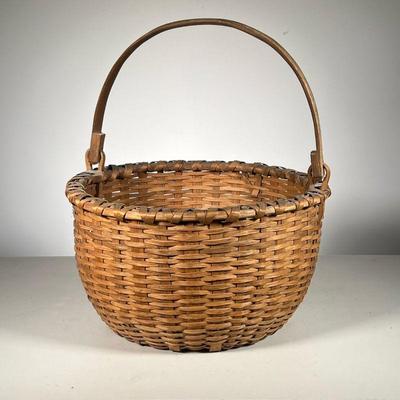 SPLINT APPLE BASKET | Vintage Basket of nice color with carved swing handle. - h. 8.75 x dia. 15.5 in (Height excludes handle)

