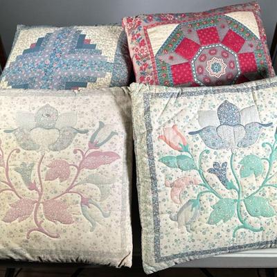 (4PC) QUILTED THROW PILLOWS | Includes; quilted elephant, floral pillows, and geometric designs.

