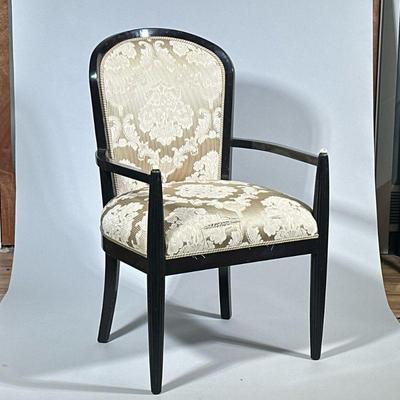 ART DECO UPHOLSTERED ARMCHAIR | Having tapering reeded legs over gold floral upholstery. - l. 25 x w. 24.5 x h. 28 in

