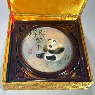 CHINESE SILK EMBROIDERED PANDATABLE SCREEN | Showing baby panda in round glass frame with carved wood stand in decorative embroidered...