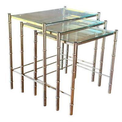 Lot 407   4 Bid(s)
Vintage Brass Bamboo Nesting Tables with Glass Tops, Set of 3