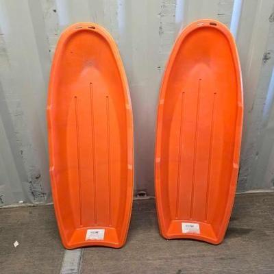 #4500 • (2) Orange Plastic Snow Sleds
