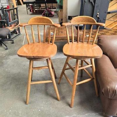#2510 • (2) Wooden Swivel Chairs
