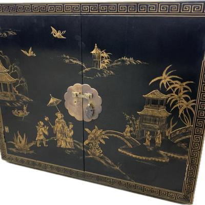 #73 • Asian Black Lacquer Chinoiserie Chest w/ Stand
WWW.LUX.BID