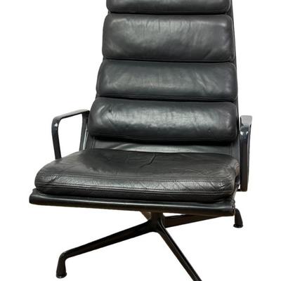#155 • Eames for Herman Miller Aluminum Group Black Soft Pad Arm Chair & Ottoman
WWW.LUX.BID